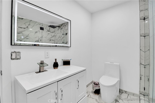 bathroom with vanity, a shower with shower door, and toilet