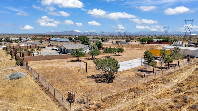 birds eye view of property featuring a mountain view