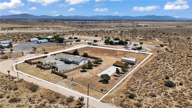 drone / aerial view featuring a mountain view