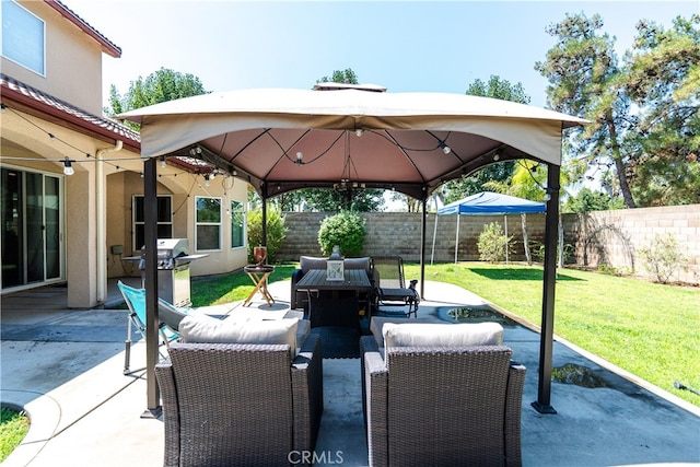 view of patio featuring a gazebo and grilling area