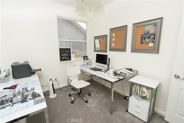 carpeted office space with lofted ceiling