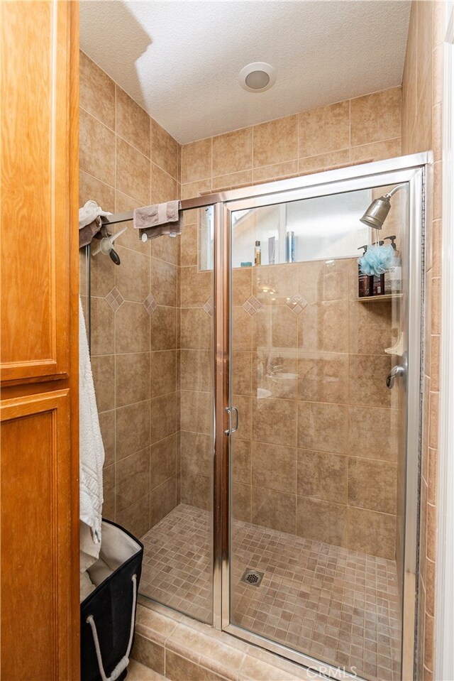 bathroom featuring walk in shower