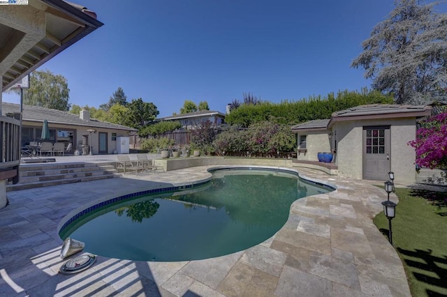 view of pool with a patio