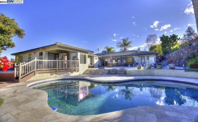 view of pool featuring a patio area