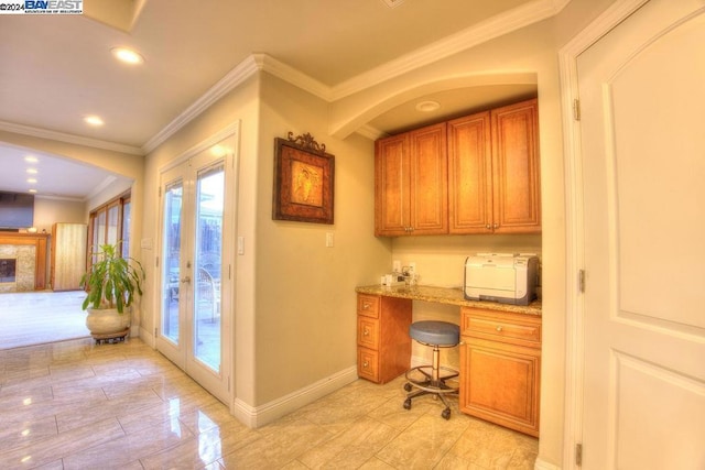 office space with ornamental molding and french doors