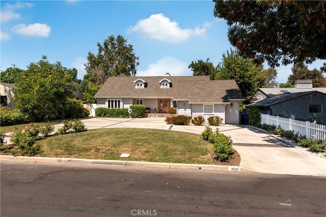 view of front of property with a front lawn