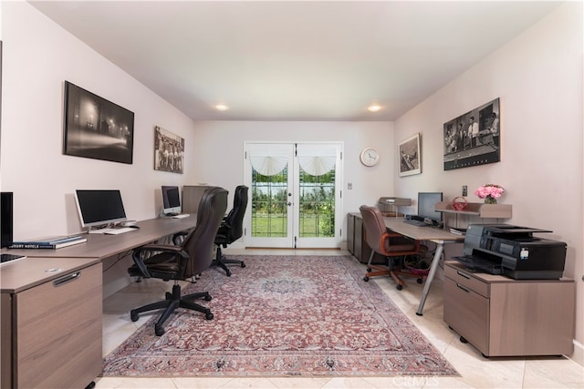 home office with light tile patterned floors and french doors