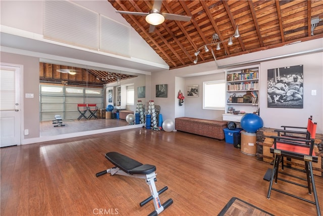 workout area with hardwood / wood-style flooring, high vaulted ceiling, ceiling fan, and wooden ceiling