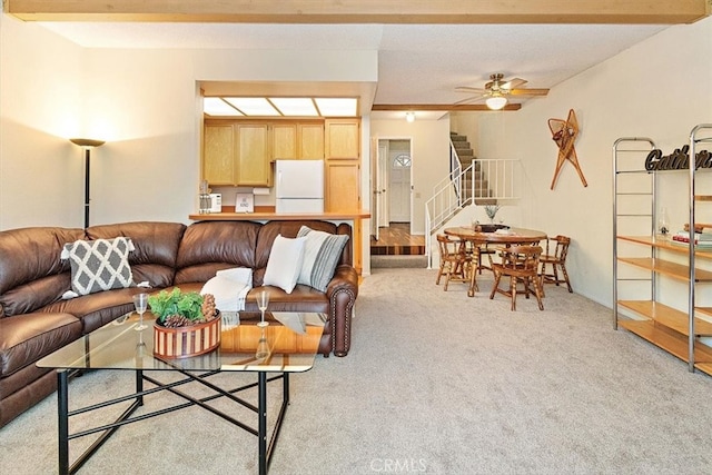 711 Cienega Rd Unit B, Big Bear Lake, CA 92315 - carpeted living room with beamed ceiling and ceiling fan