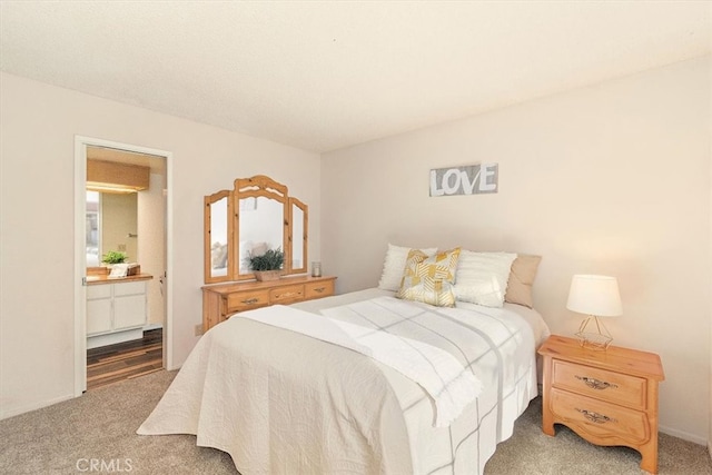 711 Cienega Rd Unit B, Big Bear Lake, CA 92315 - carpeted bedroom featuring ensuite bathroom