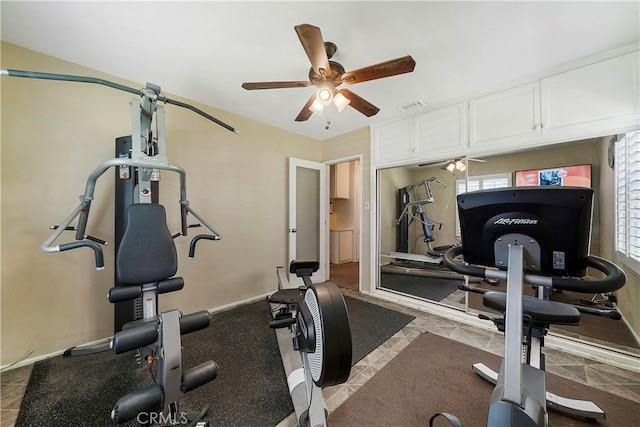 exercise area with ceiling fan