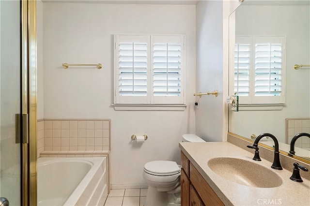 bathroom featuring vanity, toilet, a bath, and tile patterned flooring