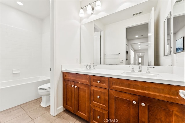 full bathroom featuring tile patterned floors, vanity,  shower combination, and toilet