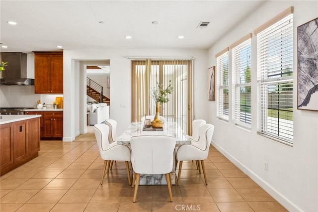 dining area with recessed lighting, light tile patterned flooring, baseboards, and visible vents