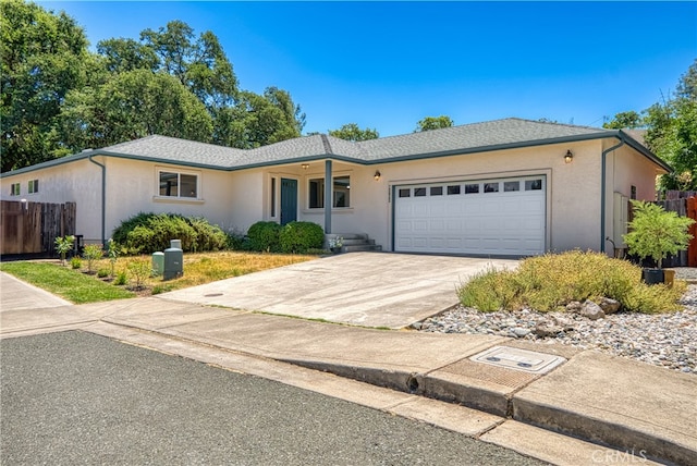 single story home featuring a garage