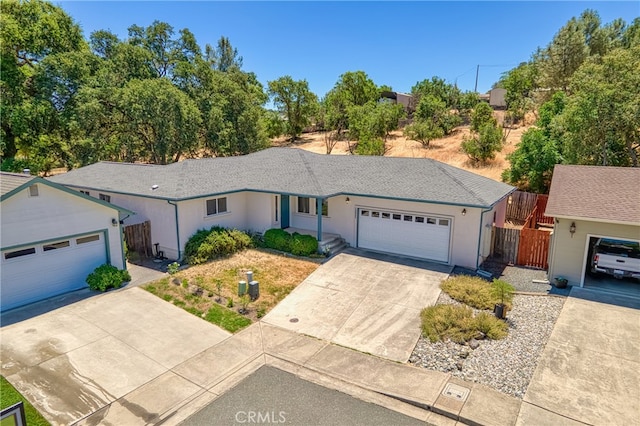 ranch-style home with a garage