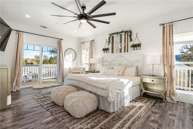 bedroom featuring dark wood-type flooring, access to outside, and ceiling fan