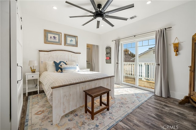 bedroom with dark hardwood / wood-style floors, access to outside, and ceiling fan