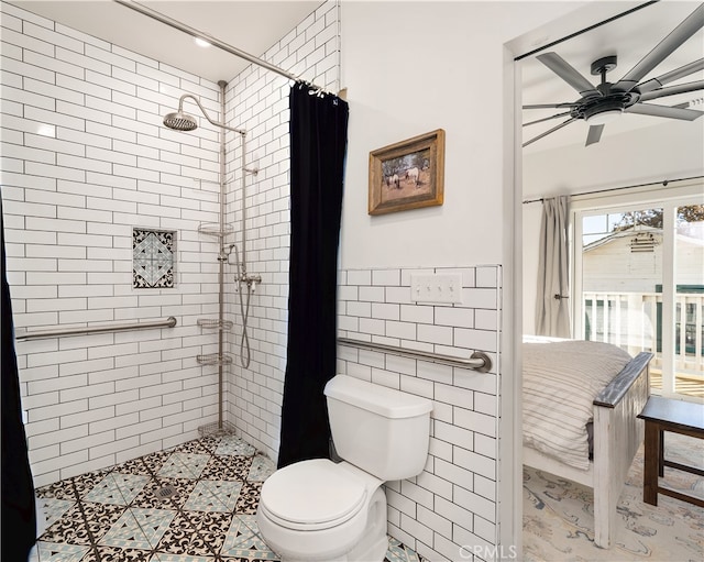 bathroom featuring toilet, a shower with curtain, tile walls, and ceiling fan