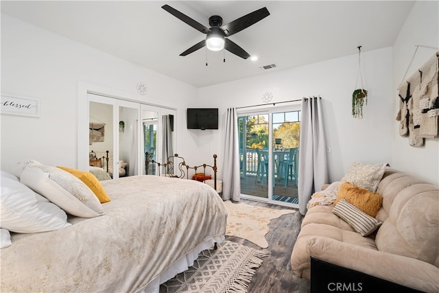 bedroom featuring wood-type flooring, access to outside, and ceiling fan