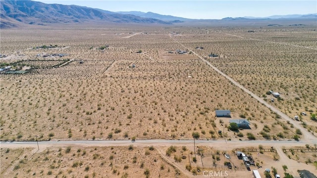 50471 Cholla Rd, Johnson Valley, CA 92285 - drone / aerial view with view of desert, a rural view, and a mountain view