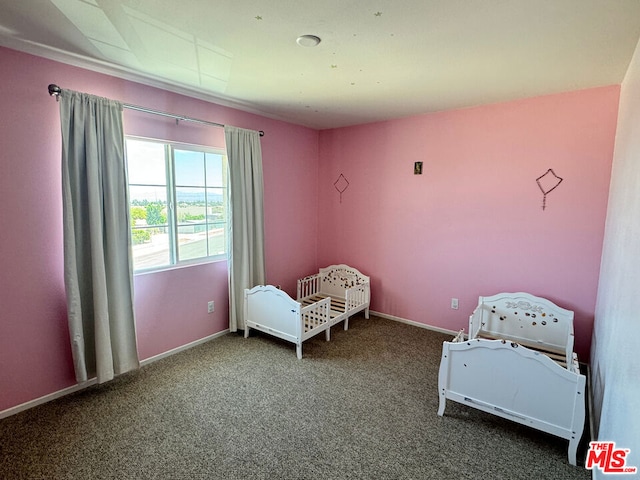 unfurnished bedroom with carpet floors