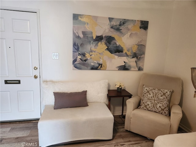 sitting room featuring hardwood / wood-style flooring