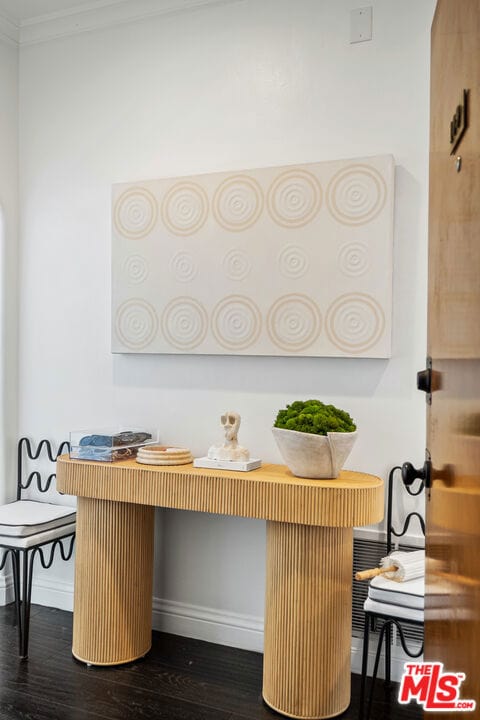 room details with wood-type flooring and crown molding