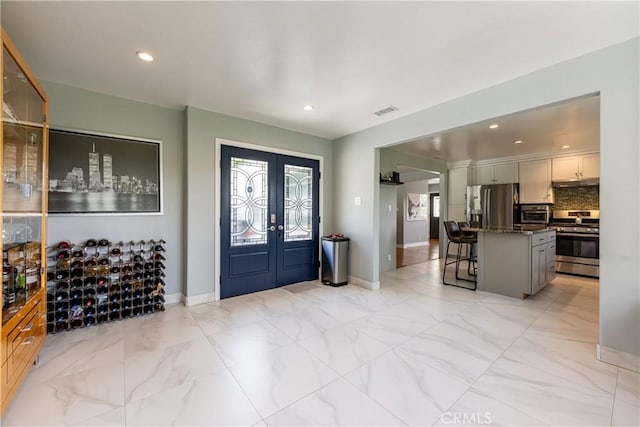 foyer featuring french doors