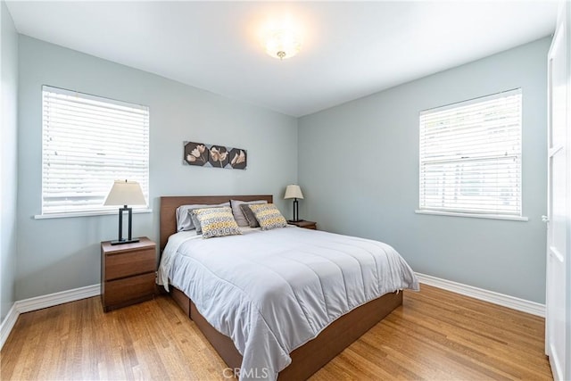 bedroom featuring light wood-type flooring