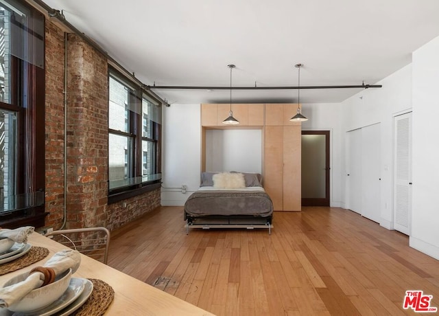 bedroom featuring hardwood / wood-style floors