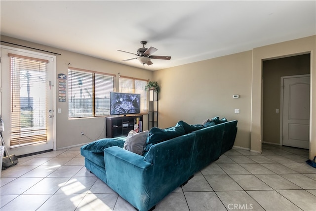 living room with light tile patterned flooring and ceiling fan