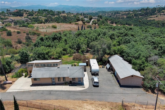 drone / aerial view featuring a mountain view