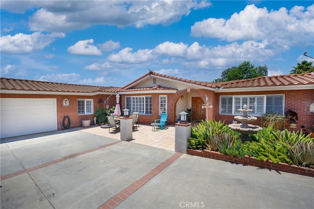 view of front of home with a garage