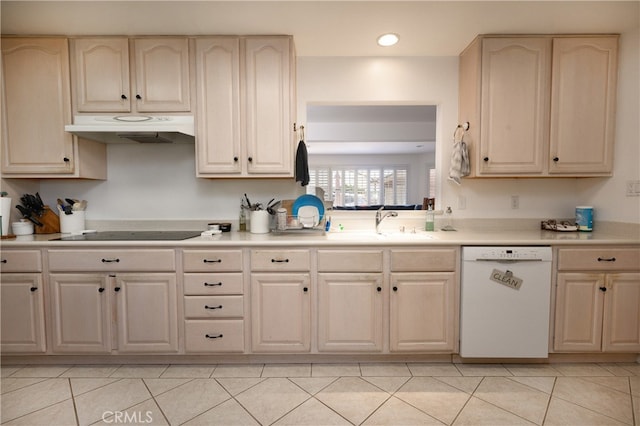 kitchen featuring sink, dishwasher, light tile patterned floors, and black electric cooktop