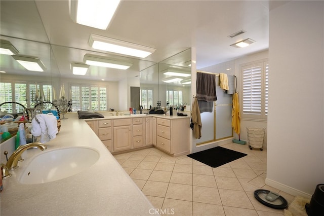 bathroom featuring vanity and tile patterned floors