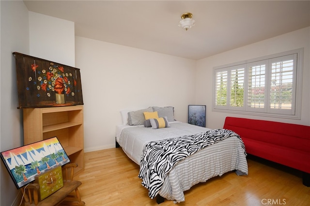 bedroom featuring light wood-type flooring