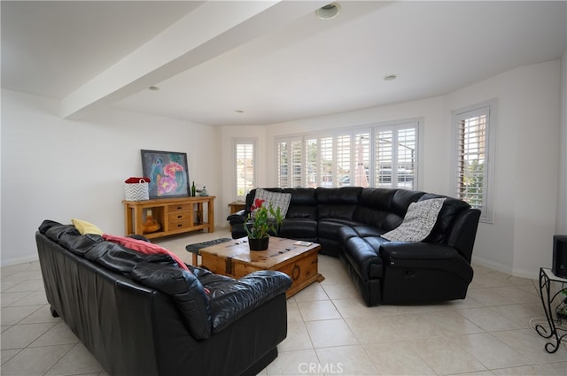 tiled living room with beamed ceiling