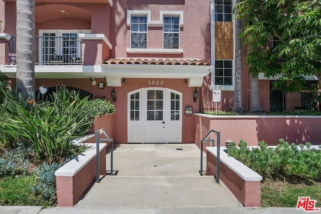 property entrance with a balcony