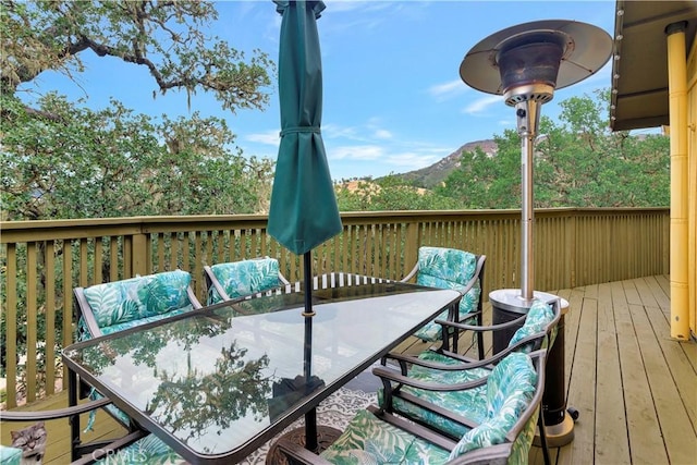 wooden terrace with a mountain view