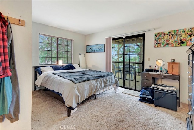 bedroom with light carpet