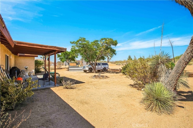 view of yard featuring a patio