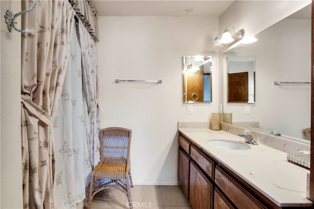 bathroom with vanity and tile patterned floors