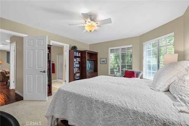 bedroom featuring ceiling fan and carpet flooring