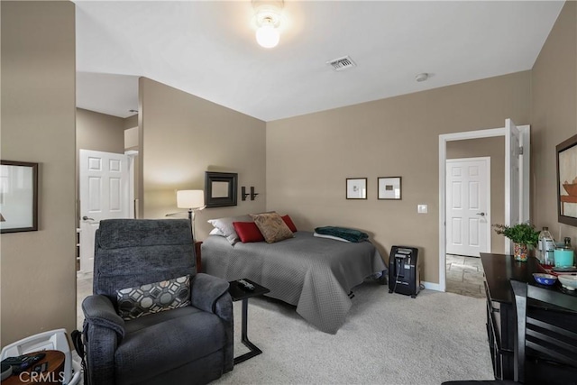 bedroom with light carpet