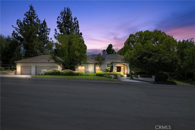 view of front of home with a garage