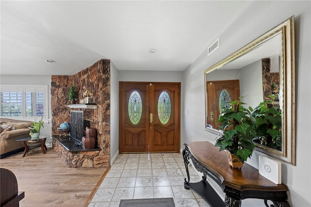 entrance foyer with light hardwood / wood-style flooring