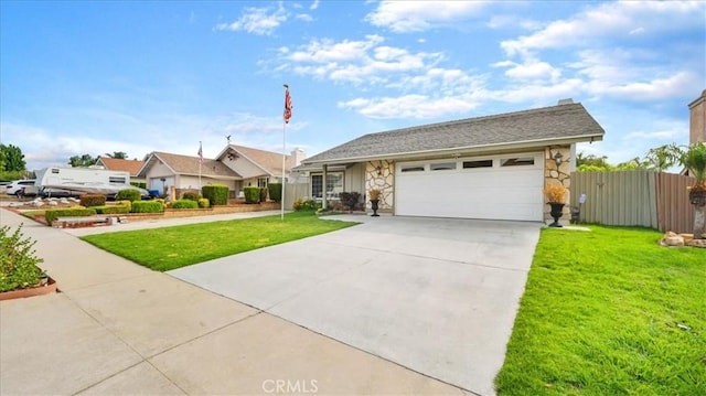 ranch-style home with a front lawn and a garage