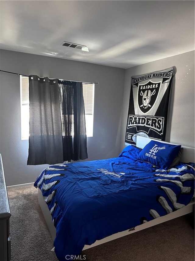 bedroom featuring carpet flooring