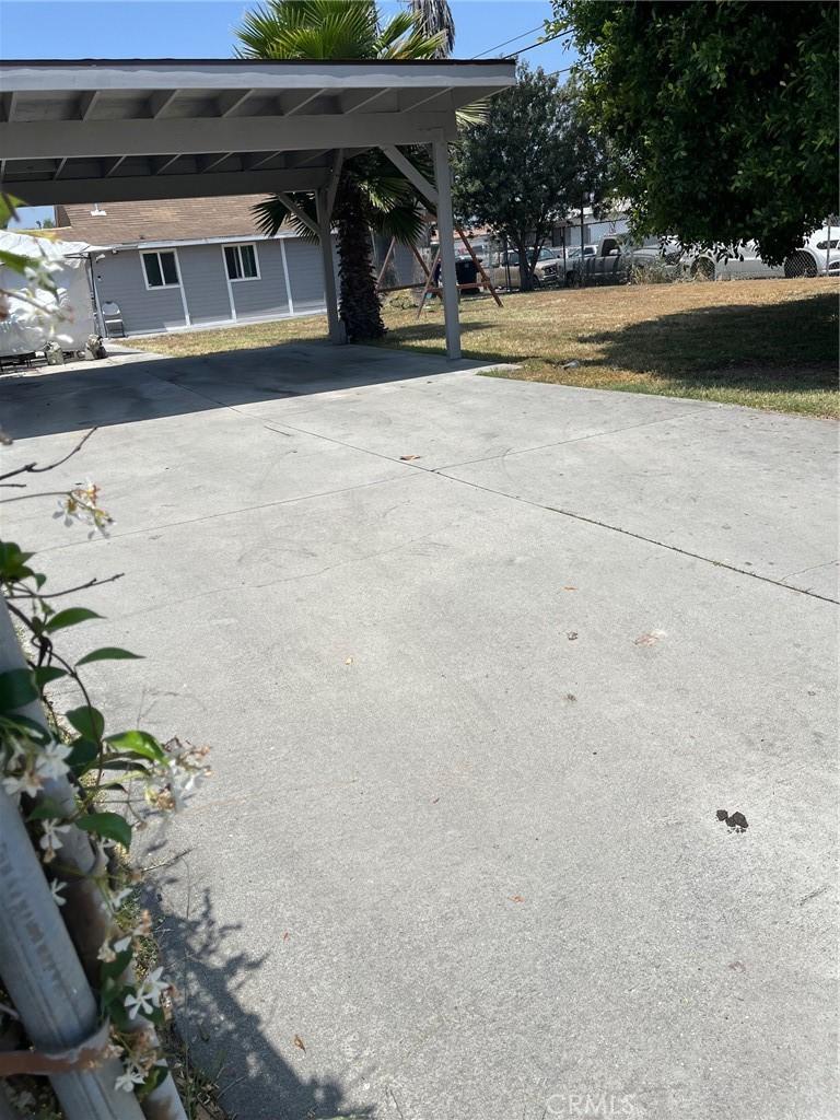 view of car parking featuring a carport